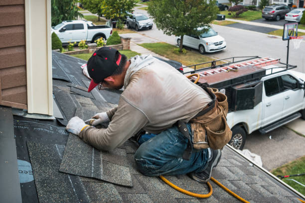 Professional Emergency Roof Repair technician working in Merrick, NY